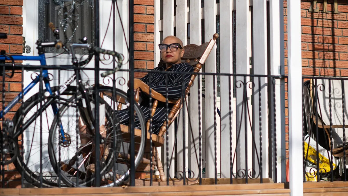 Tracey Thompson sits outside her Toronto home on April 22